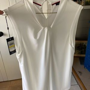 Sleeveless white silky material